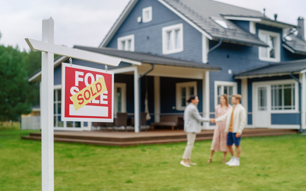 Young Couple Visiting a Potential New Home Property , SHaking Ha